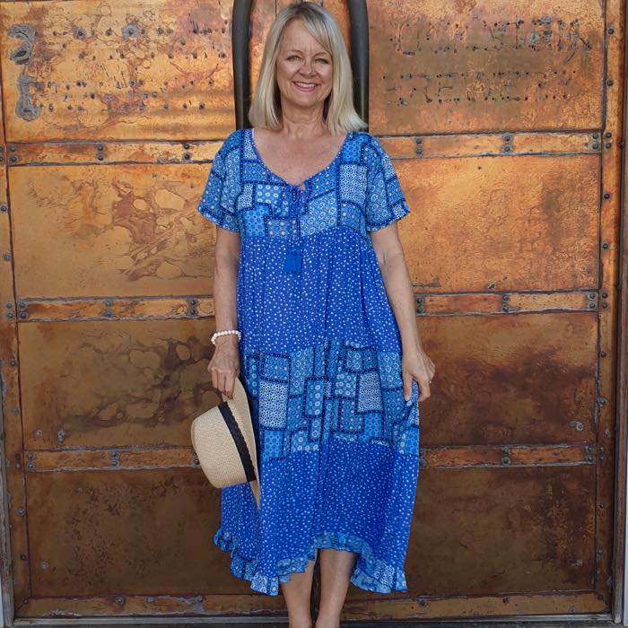 Woman wearing a blue summer sundress