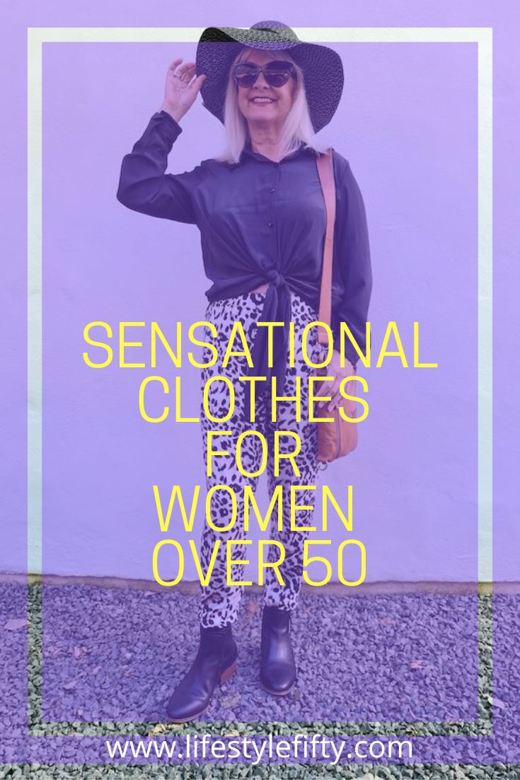 Woman modelling clothes suitable for women over 50 years old. She is wearing a black technical blouse, leopard print pants, black hat, brown leather bag and black ankle boots. The text overlay is in yellow and white print and says : Sensational Clothes for Women over 50. www.lifestylefifty.com