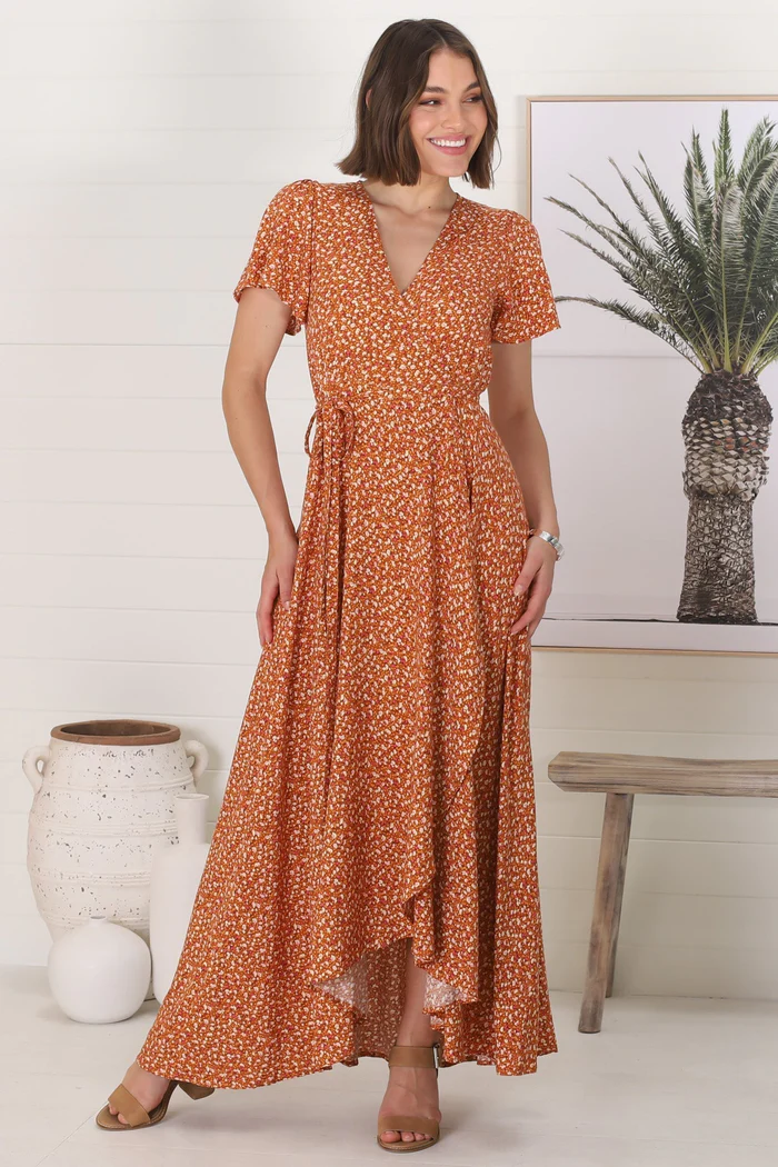 Wrap dresses are great at hiding the tummy area and this is a beautiful rust dress from Salty Crush.