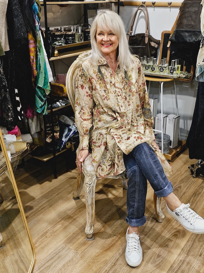 Woman over 50 wearing fashionable clothing