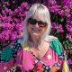 Woman in a summer dress illustrating what to pack for south of France in May.