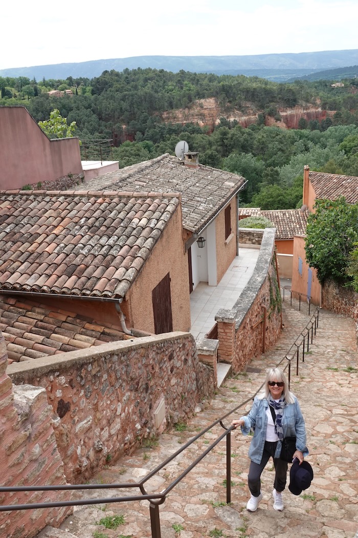 Jo Castro in Provence wearing clothes suitable for the south of France in Spring.
