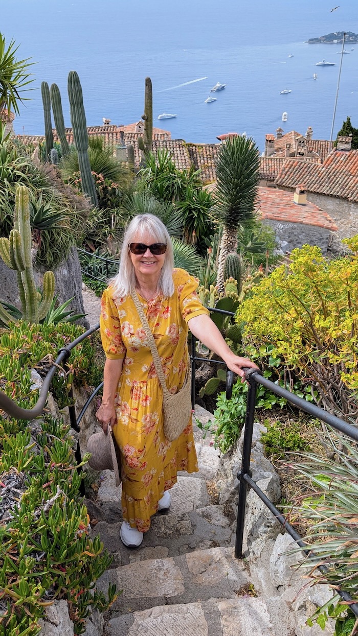 Jo Castro from Lifestyle Fifty wearing a yellow dress in the south of France in May.